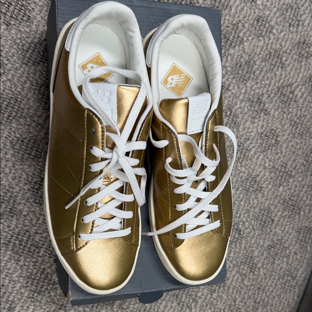 New Balance Metallic Gold Sneakers with White Accents